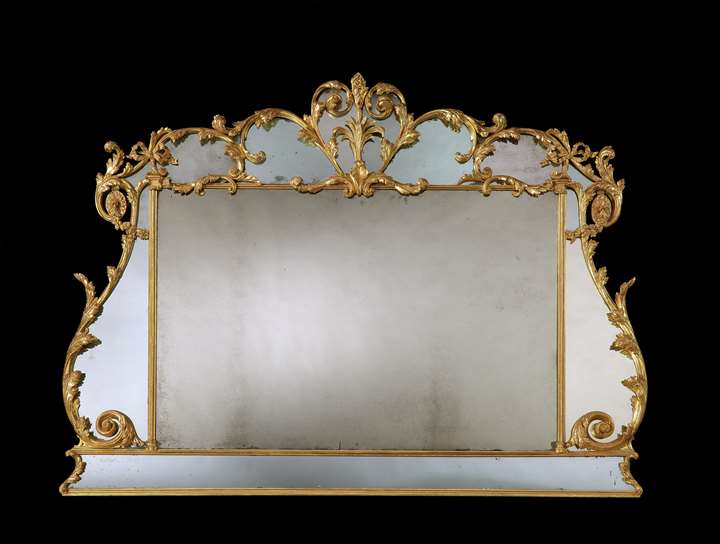 A giltwood border glass overmantel mirror